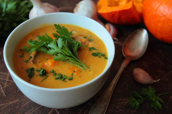 Fresh pumpkin soup with parsley herb — Stock Photo, Image