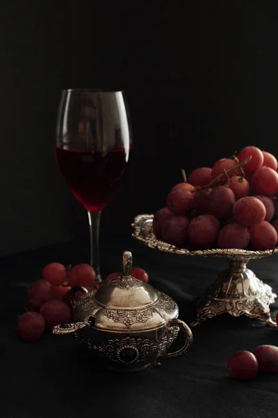 Vinho tinto e uvas Imagens De Bancos De Imagens