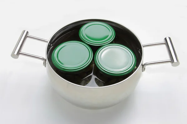 Acél pot három edény belsejében. Elszigetelt fehér background — Stock Fotó