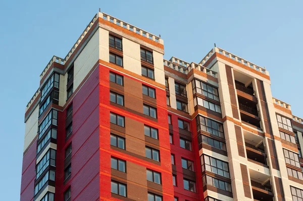 High-rise house on blue sky background