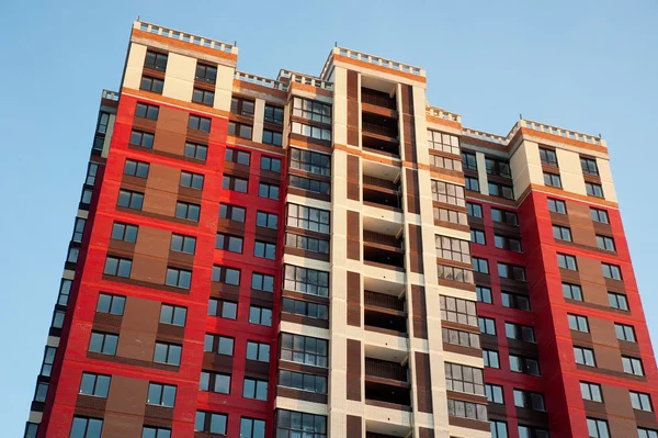 High-rise house on blue sky background