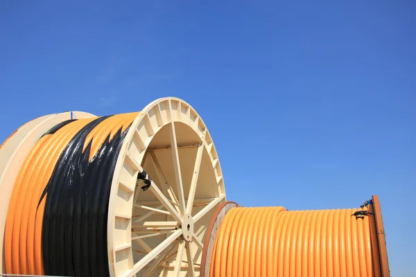 Industrial cables on large wooden reels