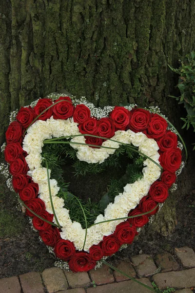 Heart shaped sympathy flowers