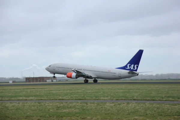 27 Maret 2015, Bandara Schiphol Amsterdam LN-RCN SAS Scandin — Stok Foto