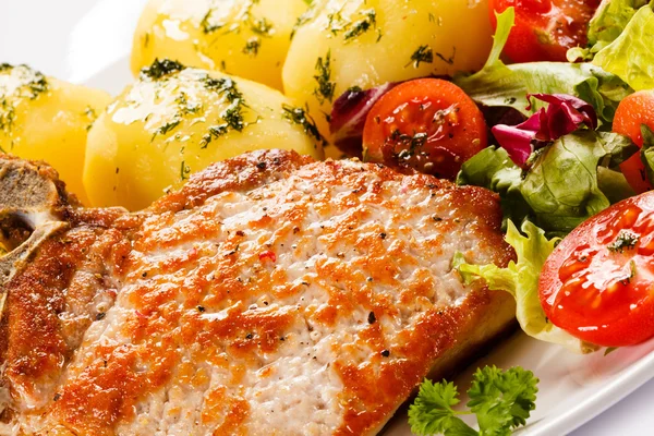 Pork chop, boiled potatoes — Stock Photo, Image