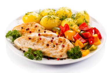 Grilled chicken breasts and vegetables clipart