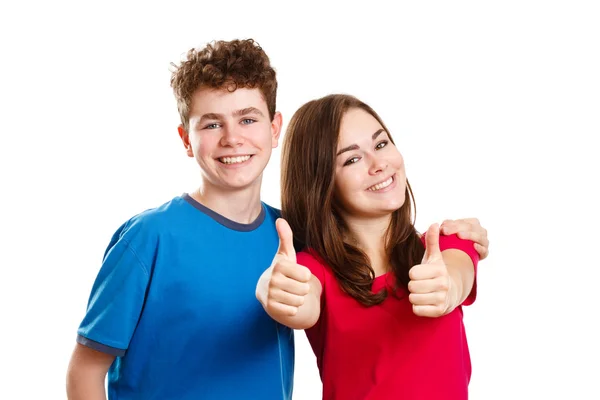 Menino e menina mostrando polegares para cima sinal — Fotografia de Stock