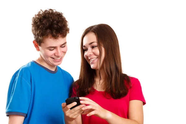 Boy and girl using mobile phone — Stock Photo, Image