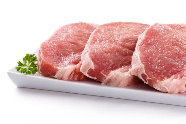 Chuletas frescas de cerdo crudo — Foto de Stock