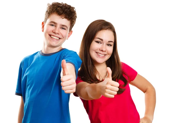 Menina e menino mostrando polegares para cima — Fotografia de Stock