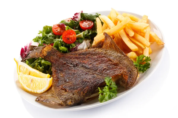 Fish dish with french fries — Stock Photo, Image