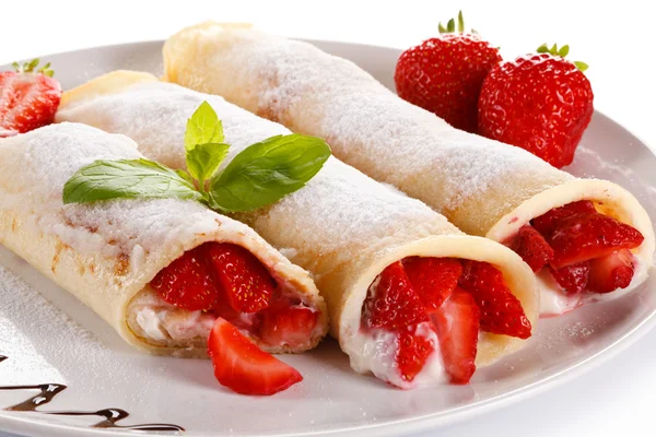 Pancakes with cream and strawberry Stock Photo