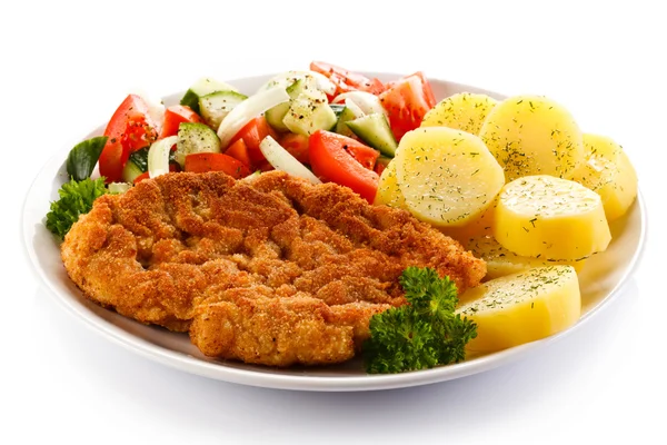 Pork chops, potatoes and vegetable salad — Stock Photo, Image