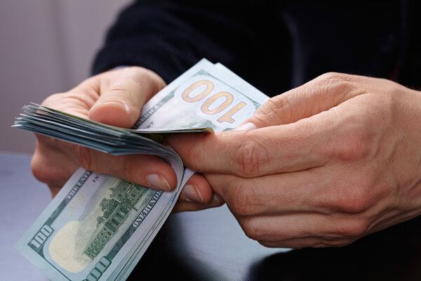 Businessman holding banknotes