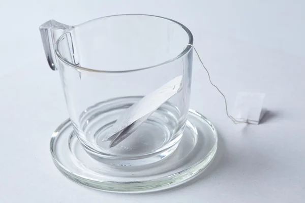 Nahaufnahme Glas Tasse mit Teebeutel — Stockfoto