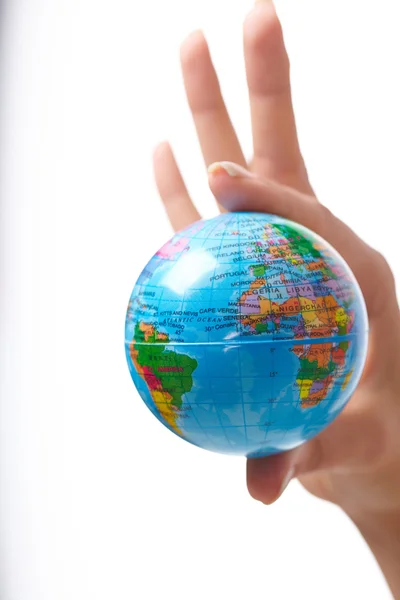 Woman's hand with globe — Stock Photo, Image