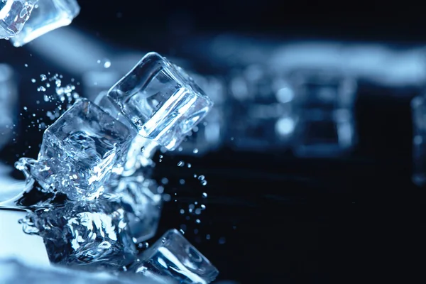 ice cubes with water splashes