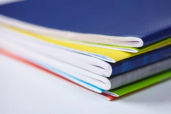 Stacked multicolored notebooks — Stock Photo, Image