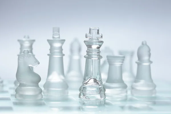 Glass chess pieces — Stock Photo, Image