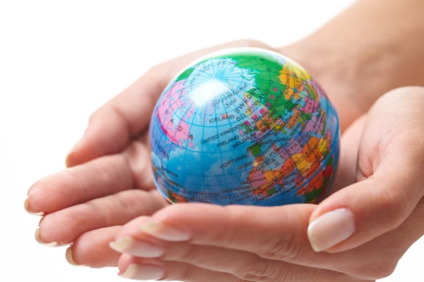 Female hands with globe — Stock Photo, Image