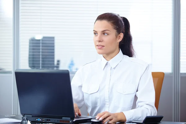 Young businesswoman at workplace — Stock Photo, Image