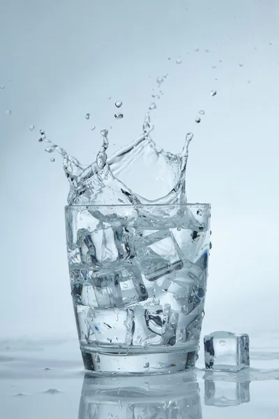 Ice cubes in water — Stock Photo, Image