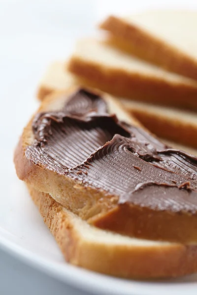 Ontbijt met chocolade boter — Stockfoto