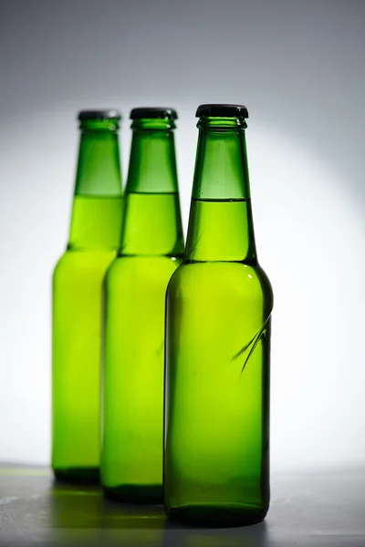 Garrafas de cerveja fechar — Fotografia de Stock
