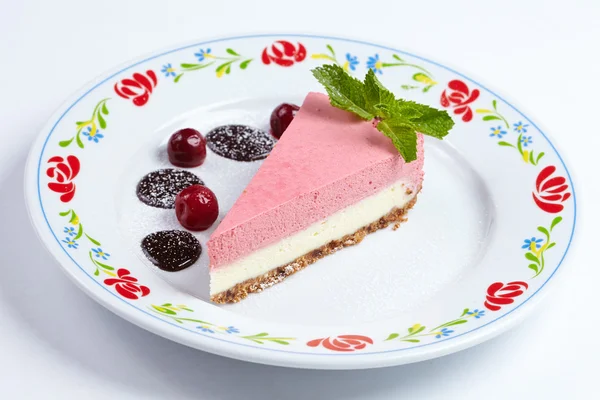 Tasty cheesecake with jam and berries — Stock Photo, Image