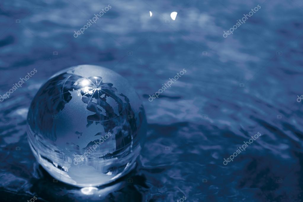Glass globe in the water — Stock Photo © strelok 119301382
