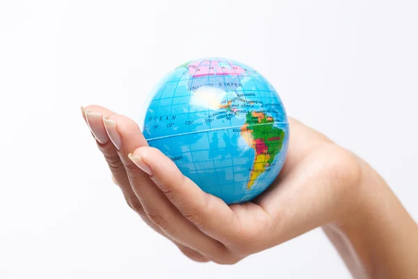 Woman's hand with globe — Stock Photo, Image
