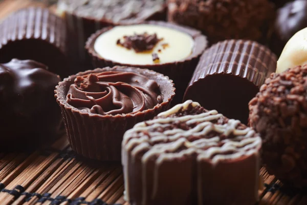 Doces de chocolate saborosos — Fotografia de Stock