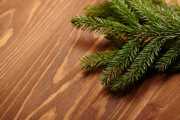 Fir Branch Wooden Background New Year Concept — стоковое фото