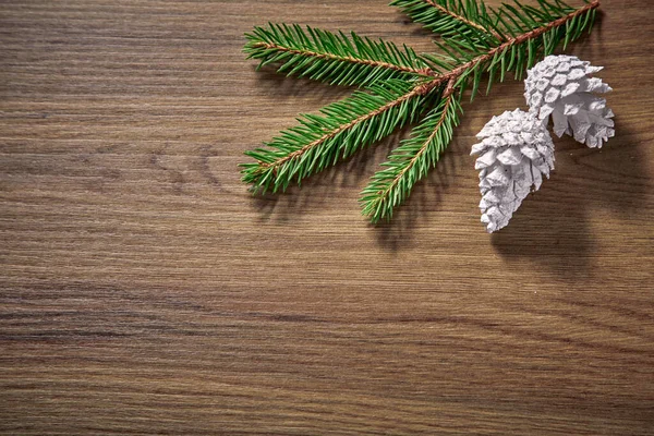 Christmas Card Christmas Tree Branches Pine Cones Wooden Background — 스톡 사진