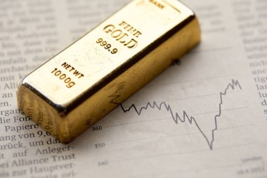 Grafikte altın külçesi, kriz sığınağı, mali kaynak, yatırım ve zenginlik konsepti