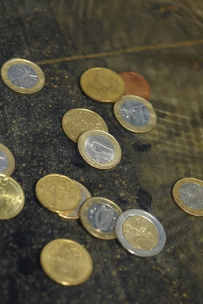 Coins under water — Stock Photo, Image