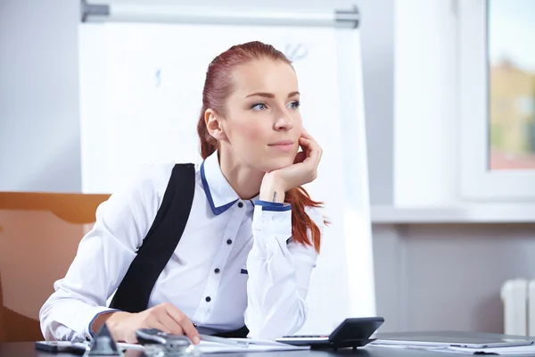 Young businesswoman at workplace Royalty Free Stock Images