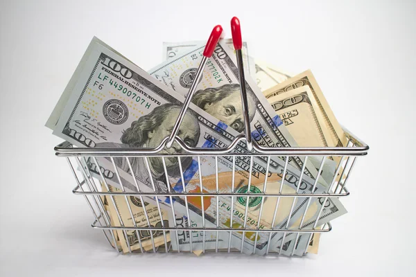 Money in shopping basket — Stock Photo, Image