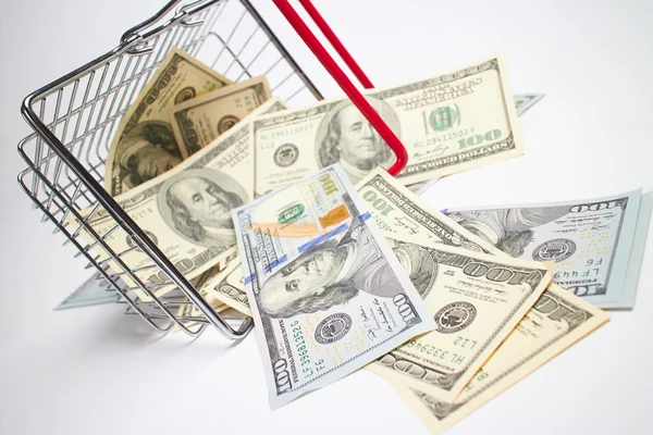 Money in shopping basket — Stock Photo, Image