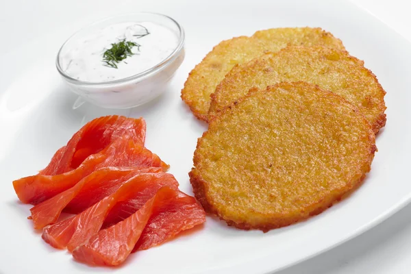 Potato pancakes with salmon — Stock Photo, Image