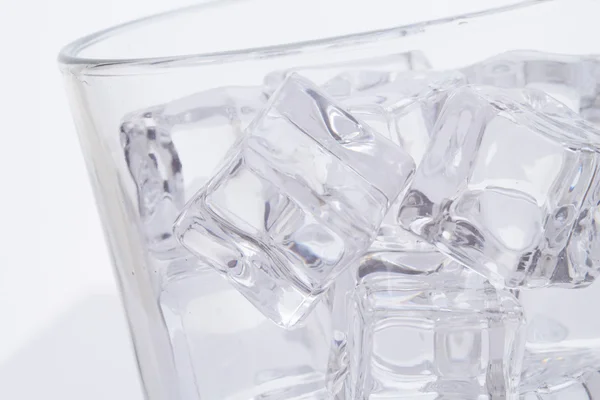 Glass with ice cubes — Stock Photo, Image