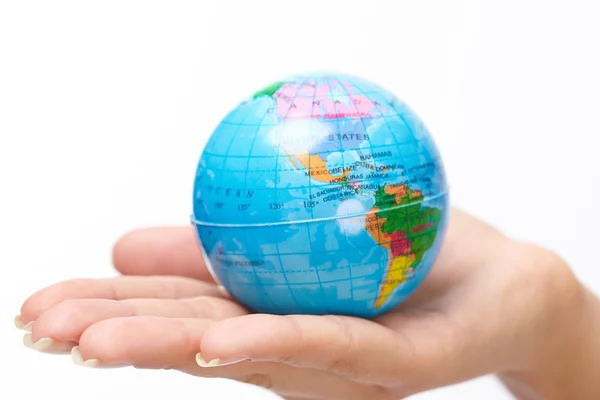 Woman's hand with globe — Stock Photo, Image