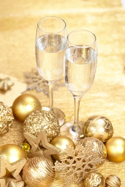 Champagne and christmas decorations — Stock Photo, Image