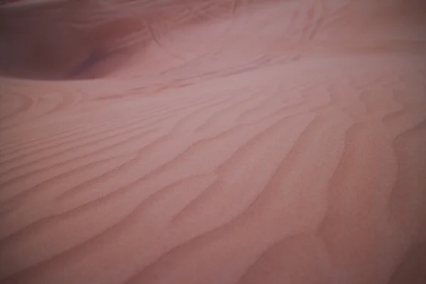 Текстура красного песка — стоковое фото