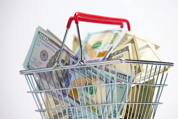 Shopping basket with money — Stock Photo, Image