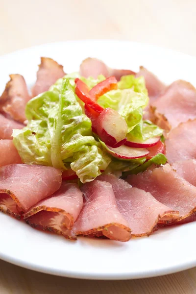 Meat appetizer with herbs — Stock Photo, Image