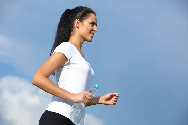 Correre donna sportiva — Foto Stock