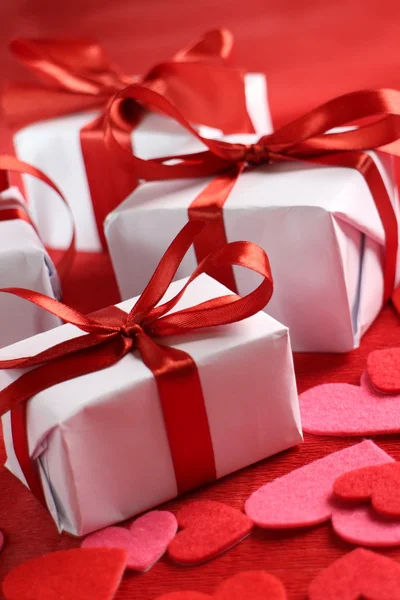 Gift boxes and hearts — Stock Photo, Image
