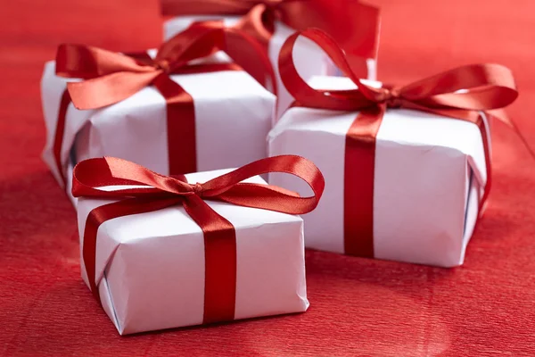 Gift boxes   on red — Stock Photo, Image