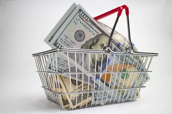 Dollar bills in basket — Stock Photo, Image